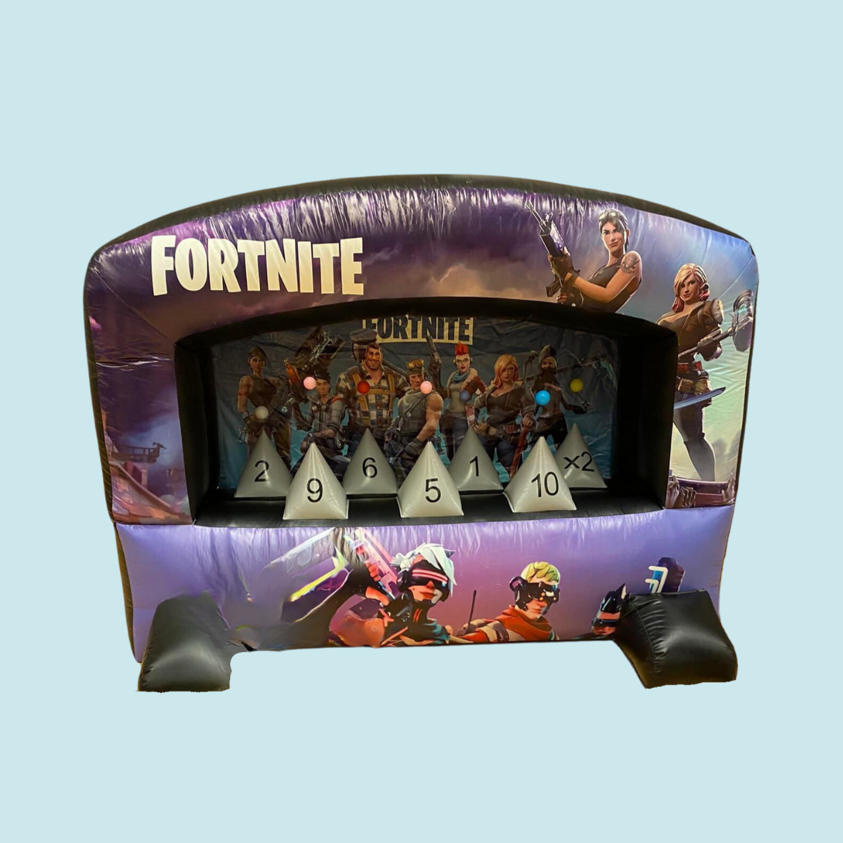 Eight shirts arranged on table in black, olive, grey, blue, white, red, mustard, and green.