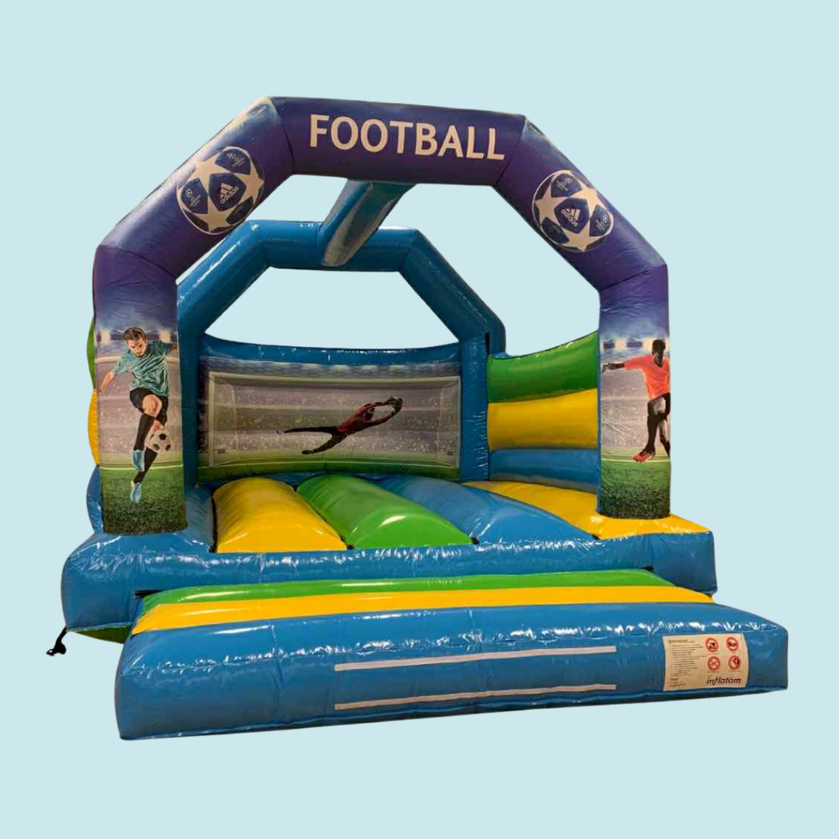 Eight shirts arranged on table in black, olive, grey, blue, white, red, mustard, and green.