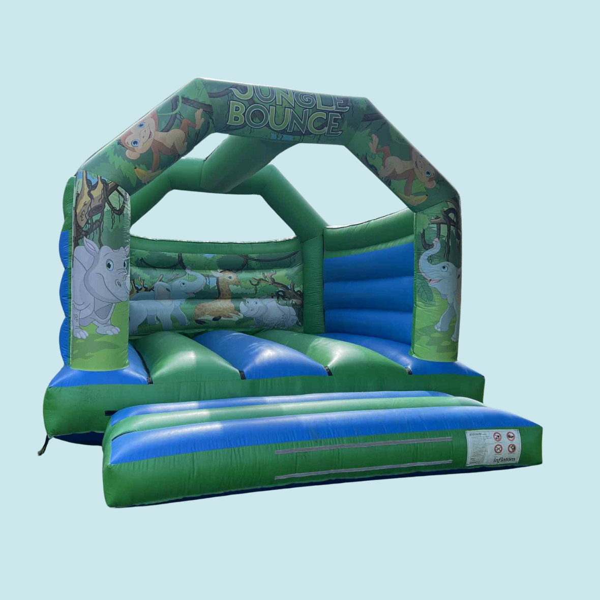 Eight shirts arranged on table in black, olive, grey, blue, white, red, mustard, and green.